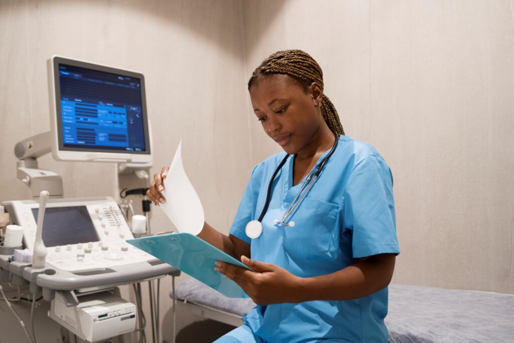 nurse wearing scrubs while working clinic